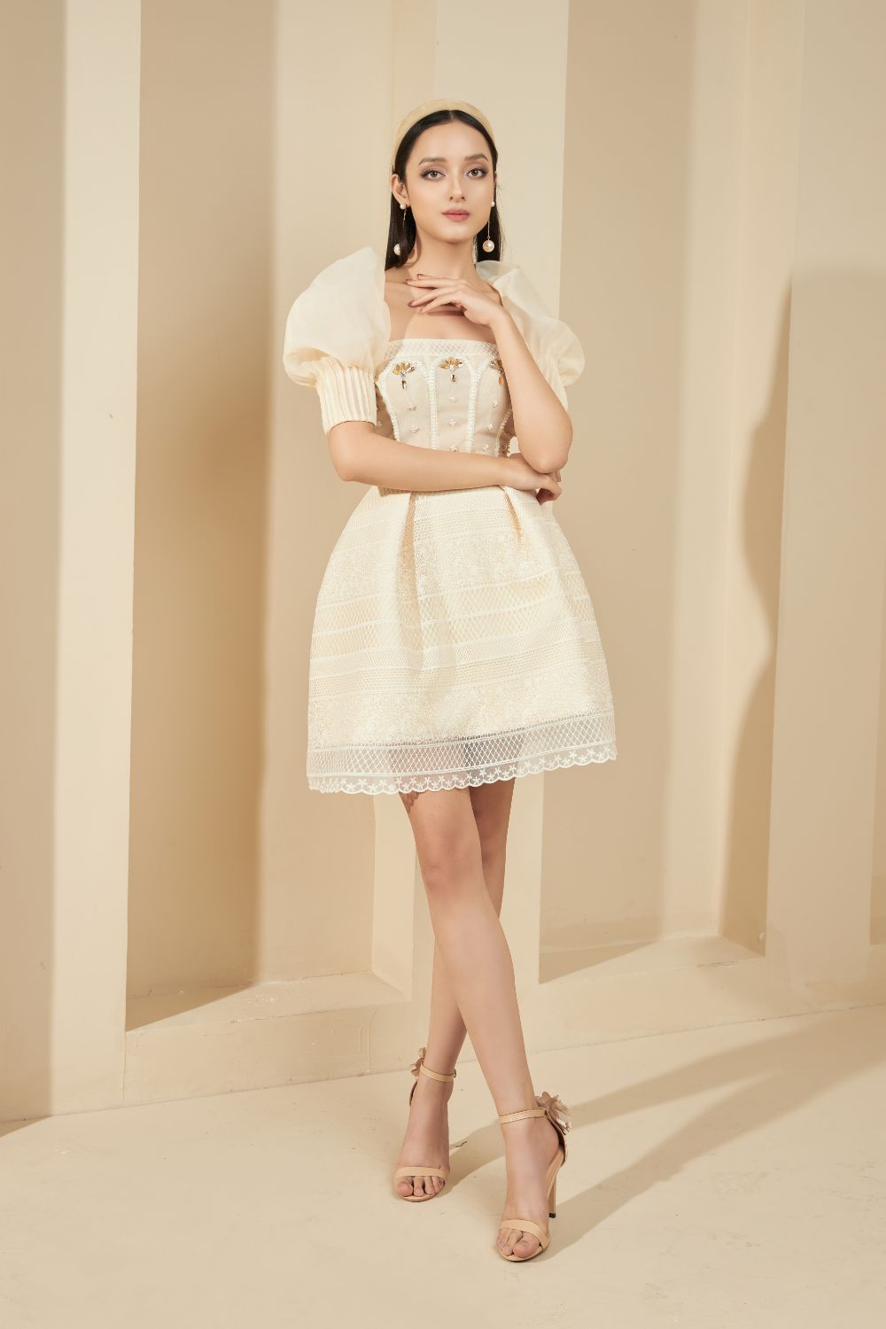 Modyis Ivory Puff Sleeve Lace Mini Dress with Gold Floral Brooch