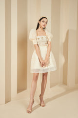 Modyis Ivory Puff Sleeve Lace Mini Dress with Gold Floral Brooch