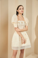 Modyis Ivory Puff Sleeve Lace Mini Dress with Gold Floral Brooch